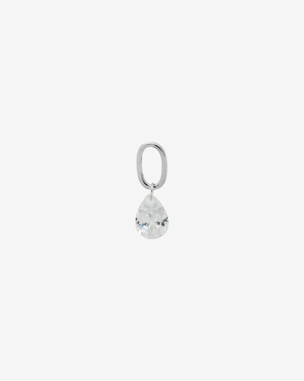 Şener Besim Teardrop Charm with crystal cubic zirconia in rhodium plating, flat lay