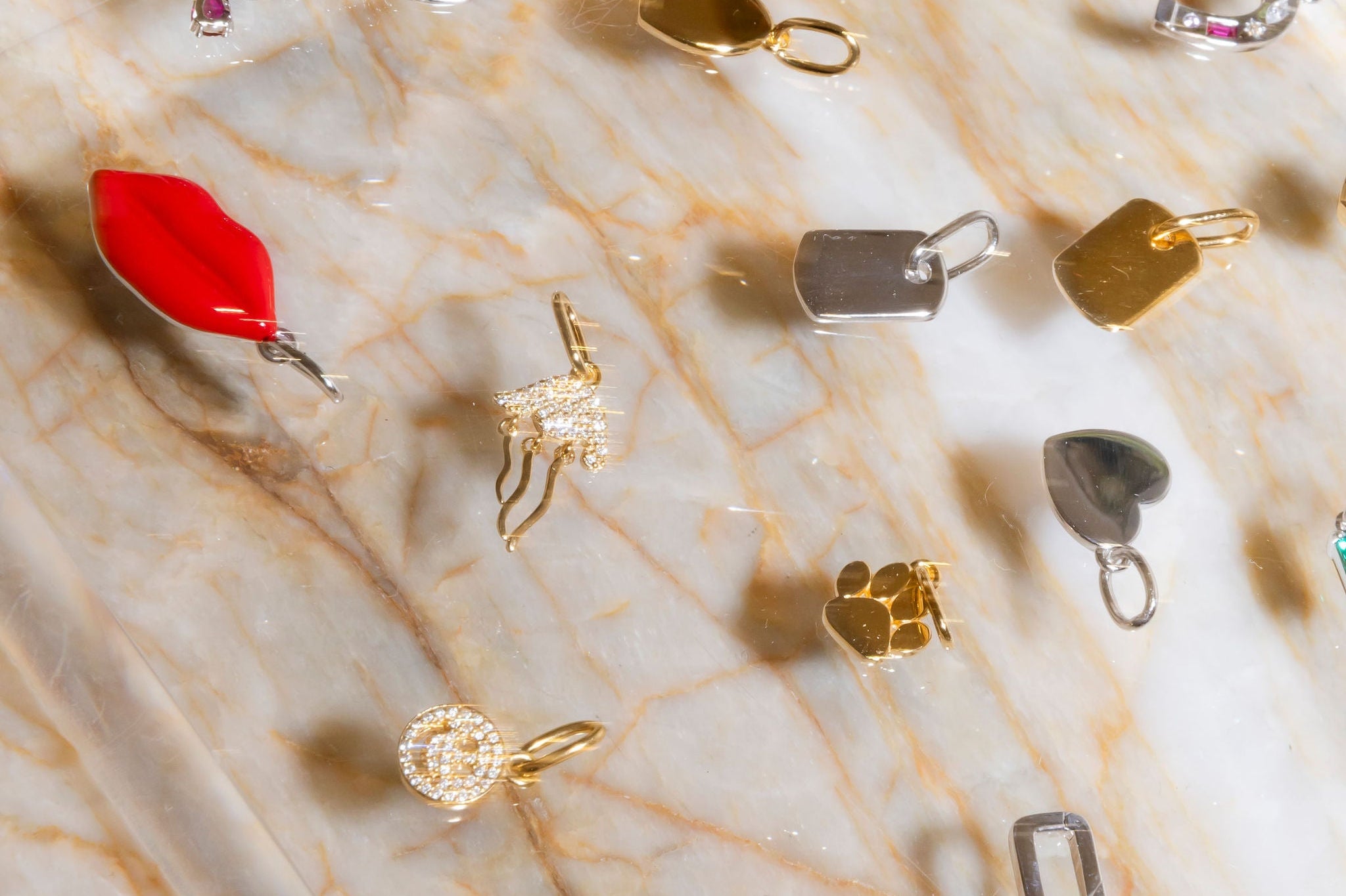 Sener Besim Gold and Silver Charms Flay Lay