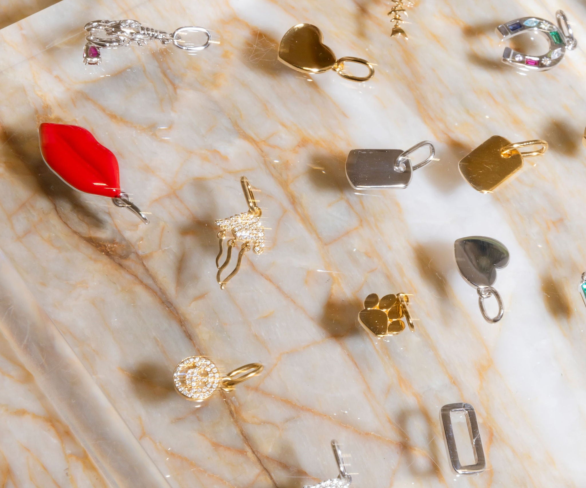 Sener Besim Gold and Silver Charms Flay Lay