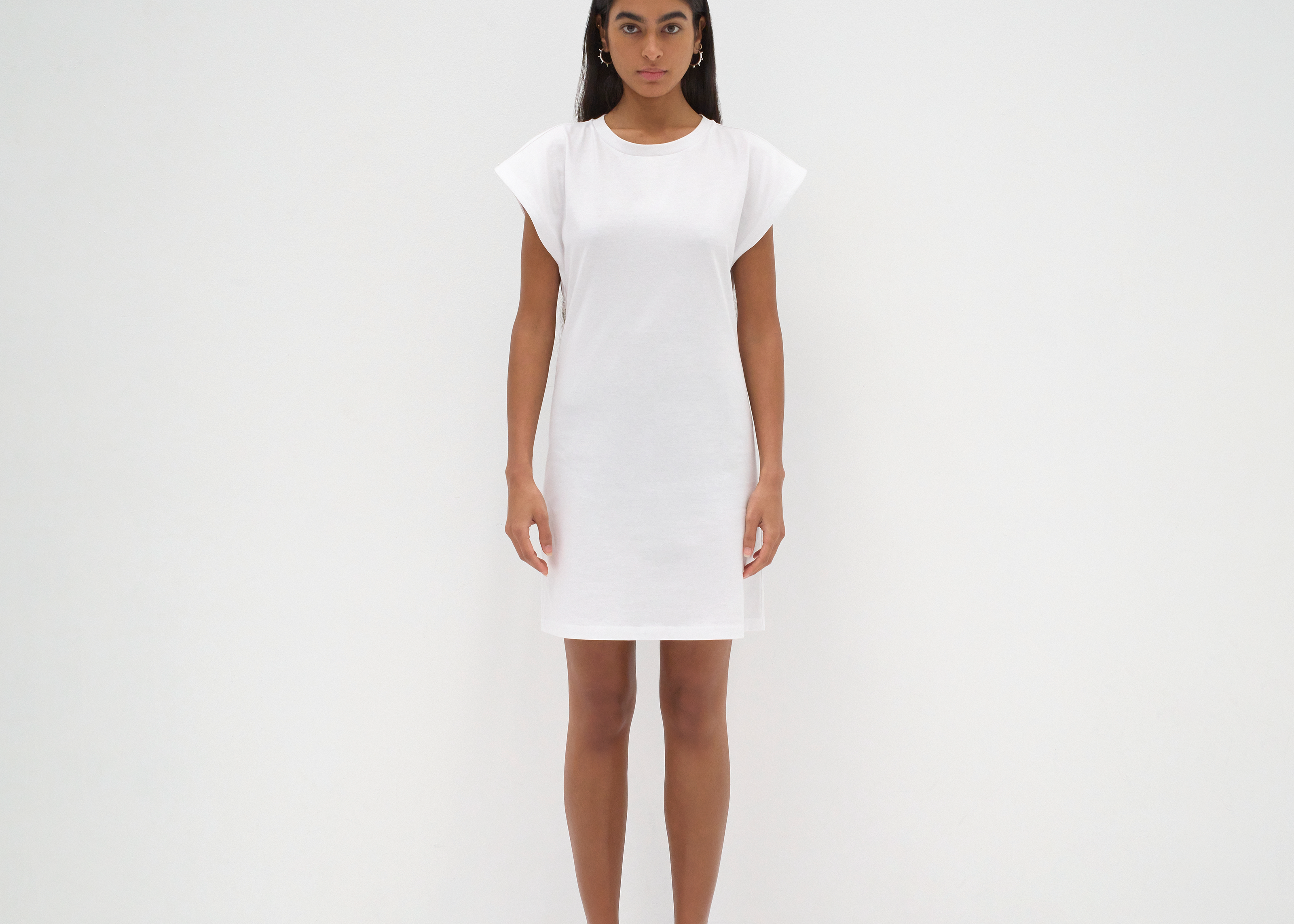 The Mini Open Back Dress in White - Front View
