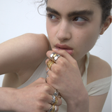 Model wearing Sener Besim Heart Rings