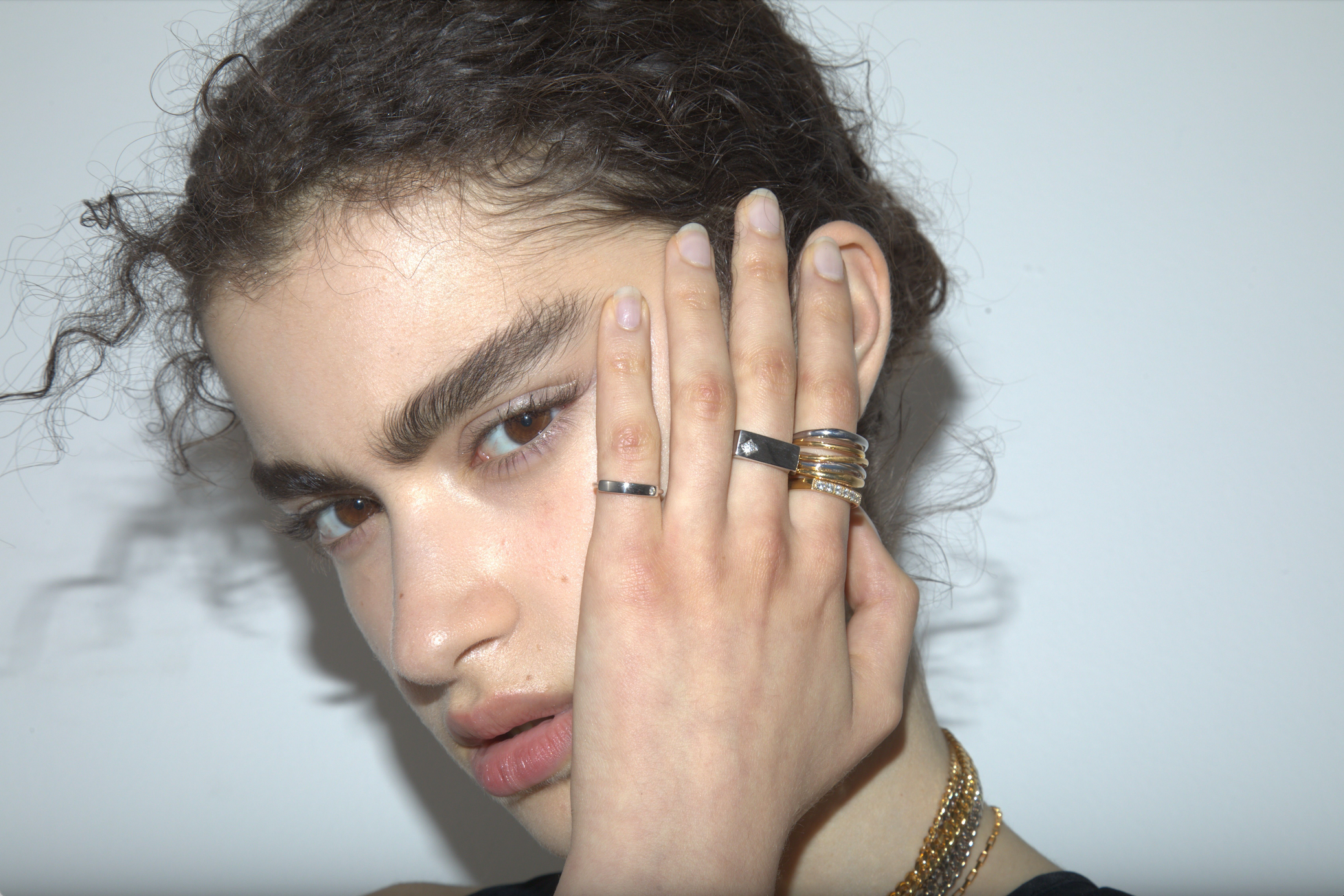 Sener Besim diamond bar ring worn by model, silver