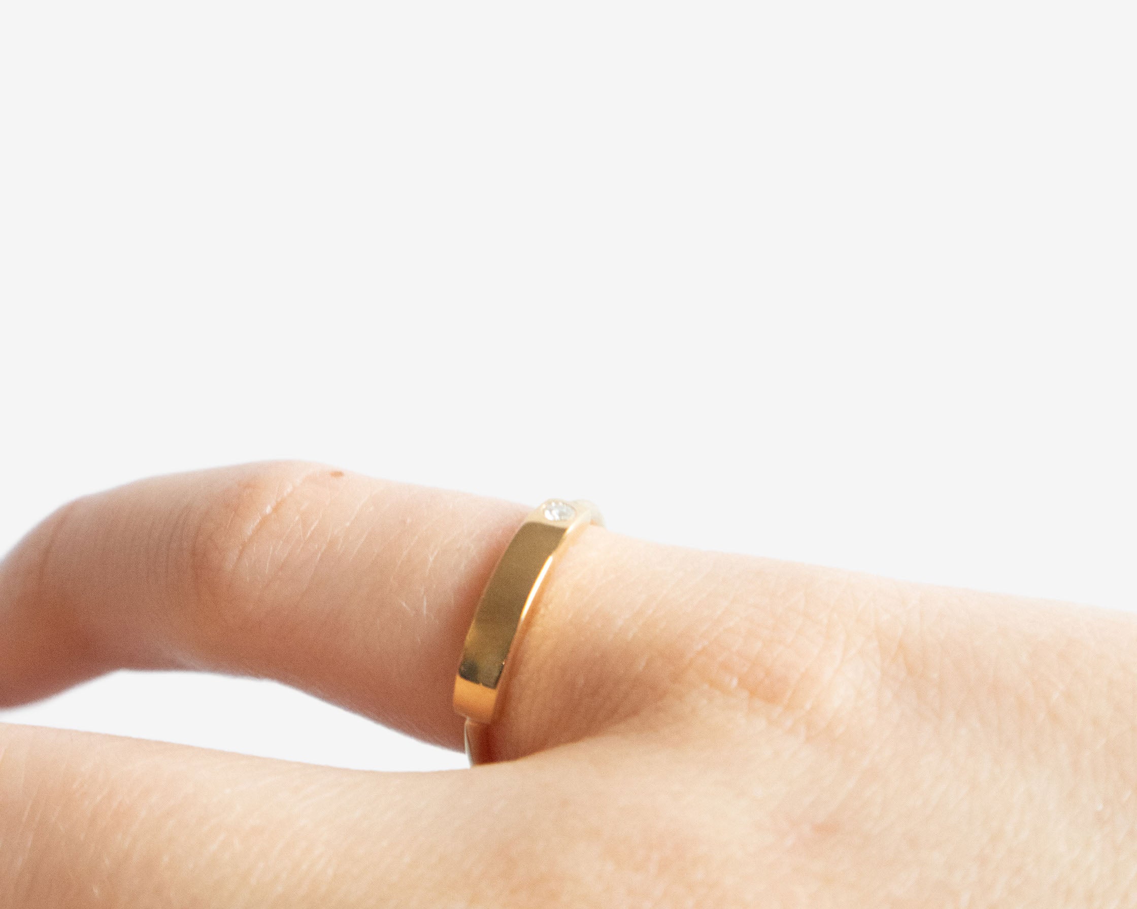 minimalist pinkie ring with diamond sener besim