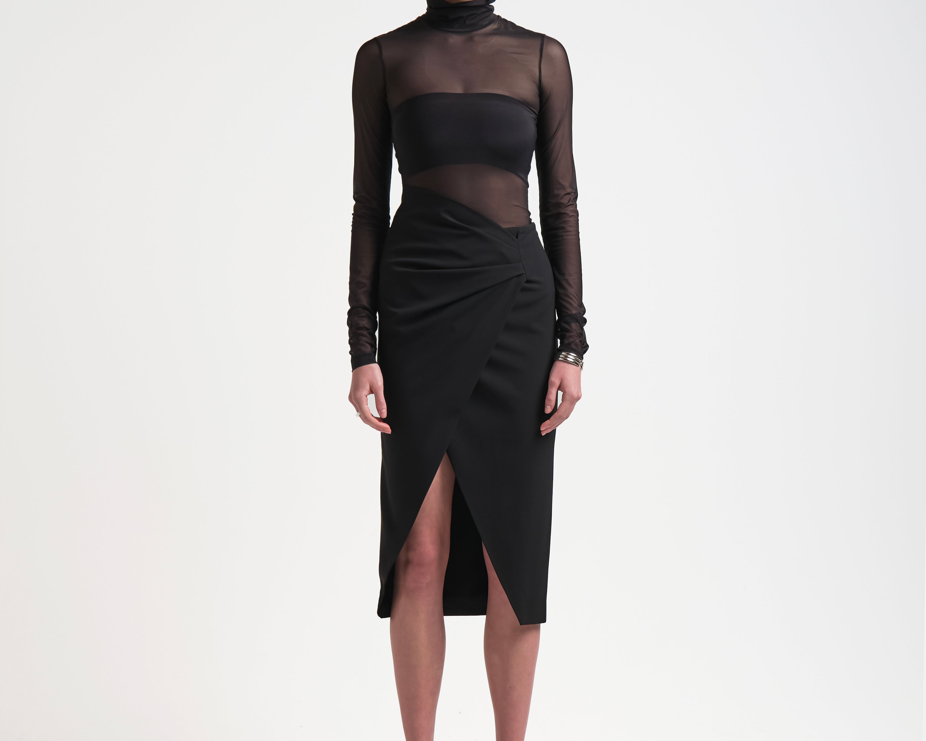 model in asymmetric skirt with ruching by sener besim
