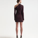 burgundy asymmetric neckline dress by sener besim on model