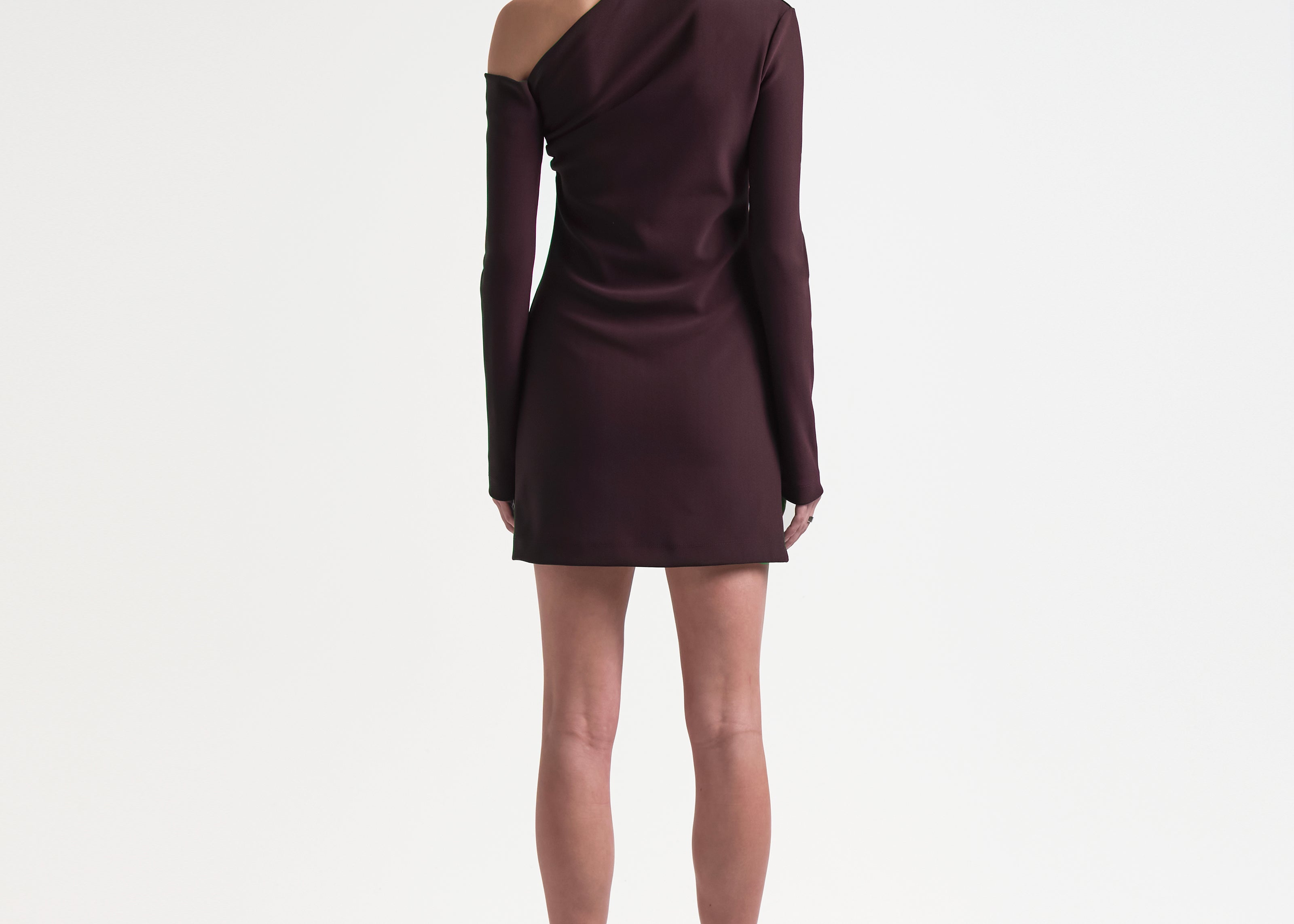 burgundy asymmetric neckline dress by sener besim on model