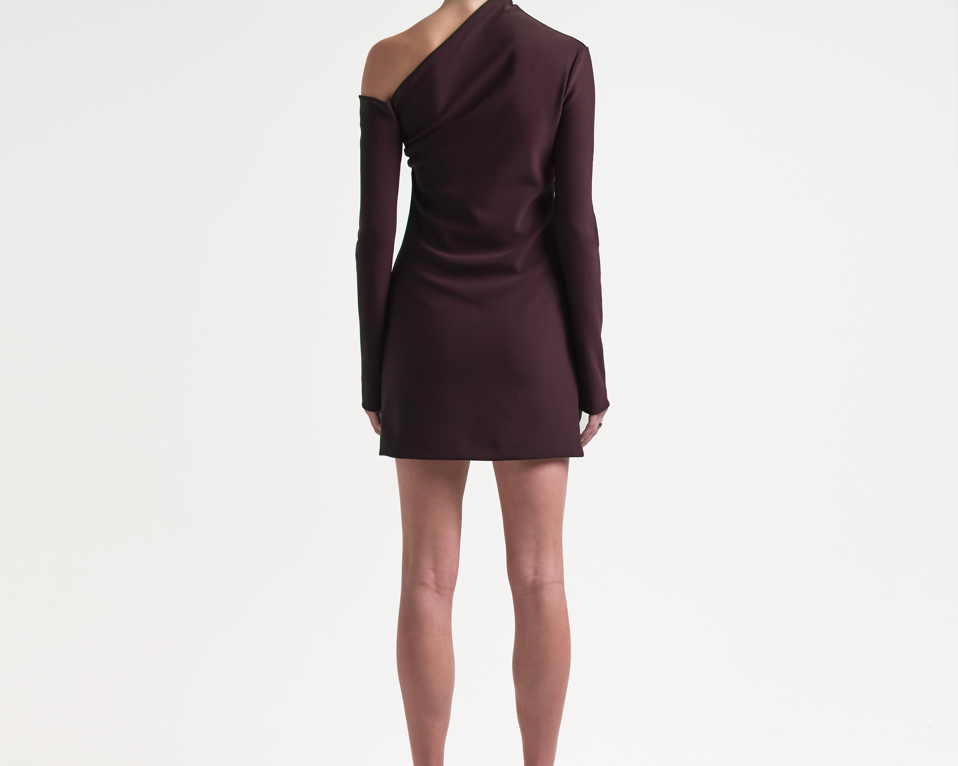 burgundy asymmetric neckline dress by sener besim on model