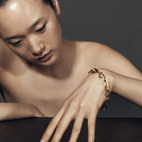 model wearing sener besim irregular bracelet