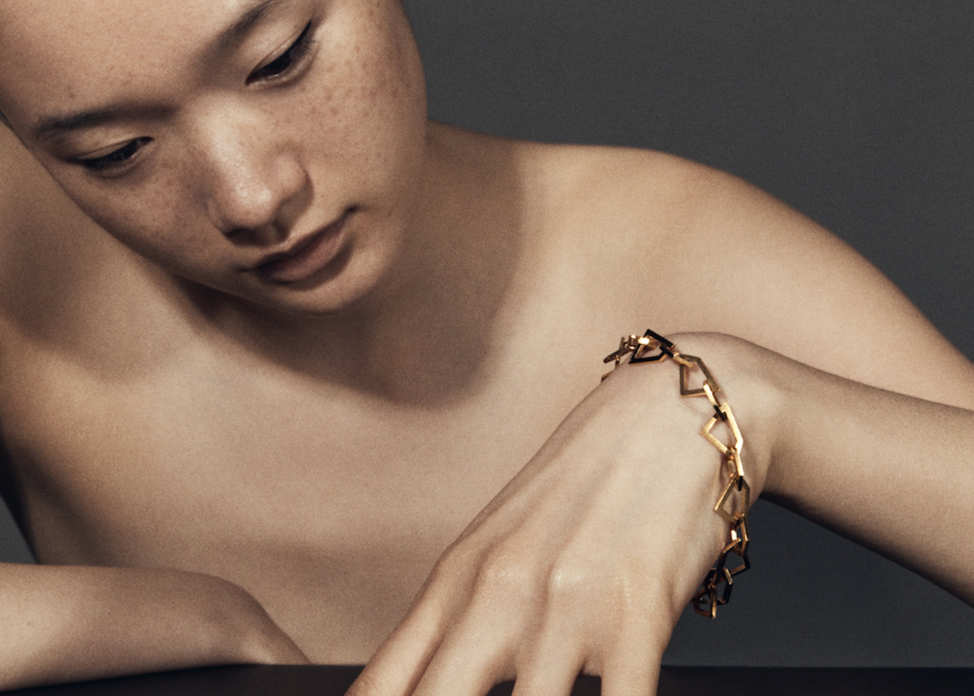 model wearing sener besim irregular bracelet