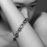 model wearing sener besim modern bracelet