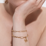 Oval Carabiner with Gems styled on a layered bracelet — Sener Besim buildable jewellery