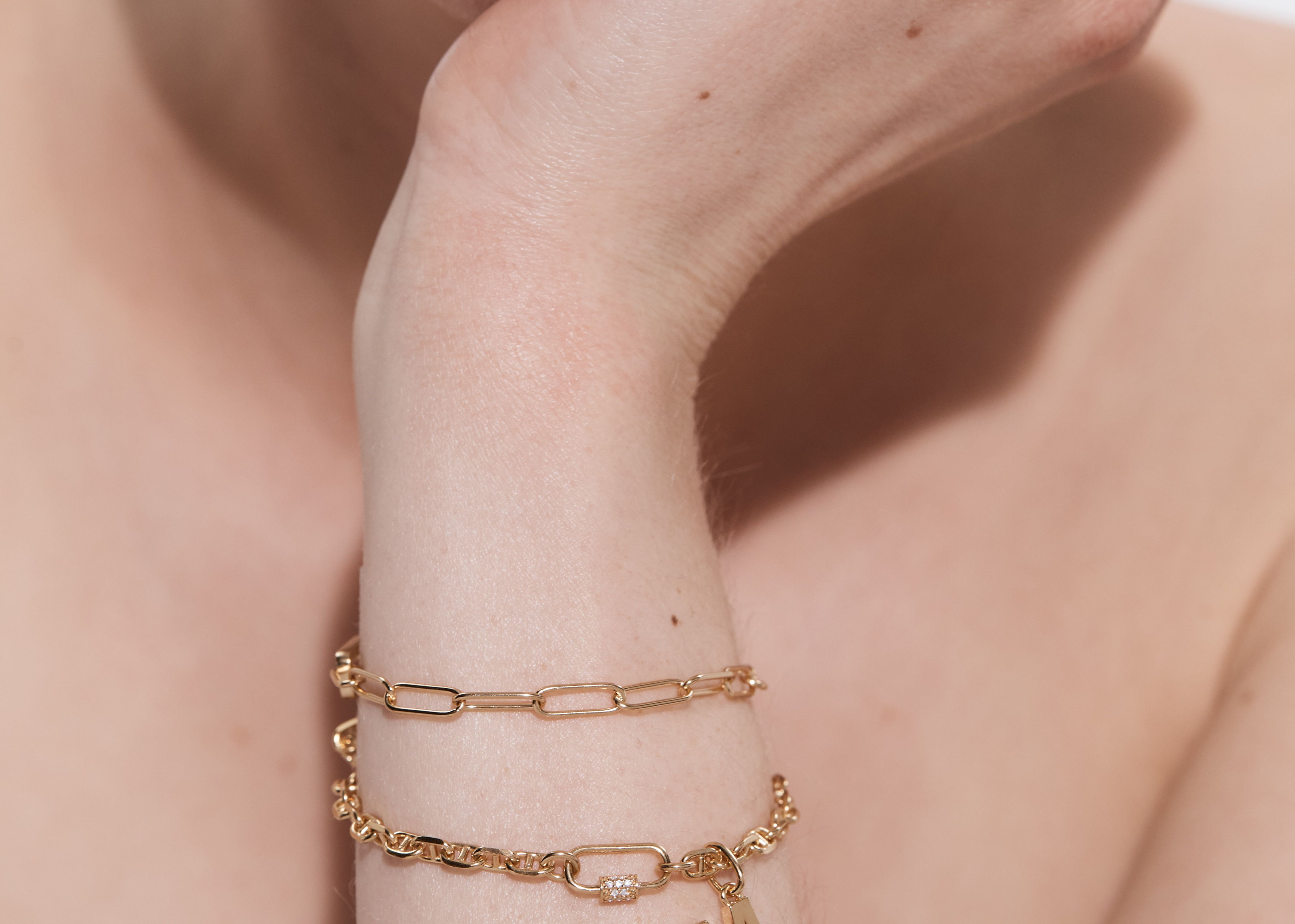 Oval Carabiner with Gems styled on a layered bracelet — Sener Besim buildable jewellery