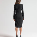 sener besim dress on model with shoulder pads and long sleeves