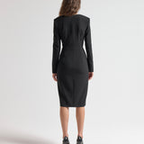sener besim dress on model with shoulder pads and long sleeves