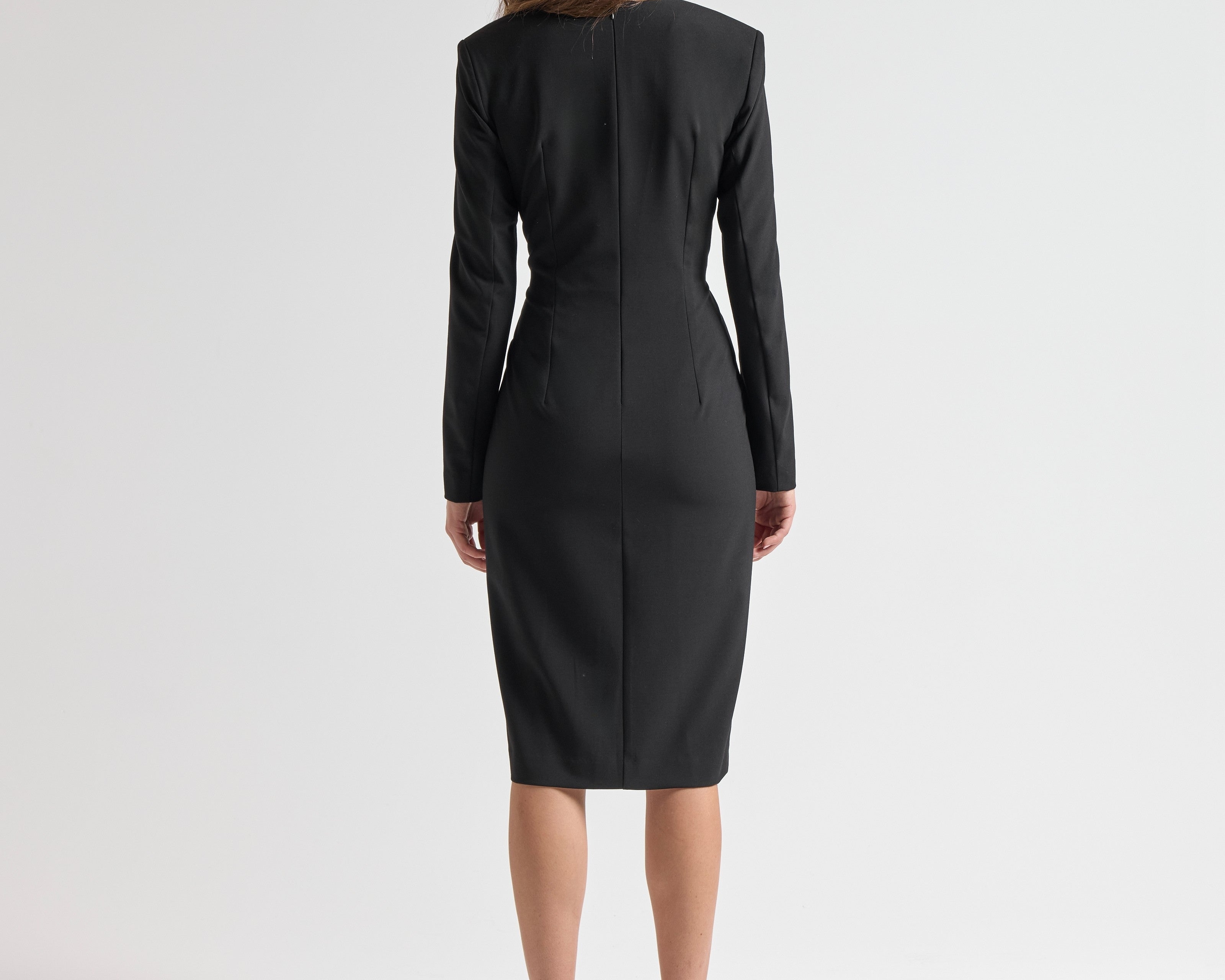 sener besim dress on model with shoulder pads and long sleeves