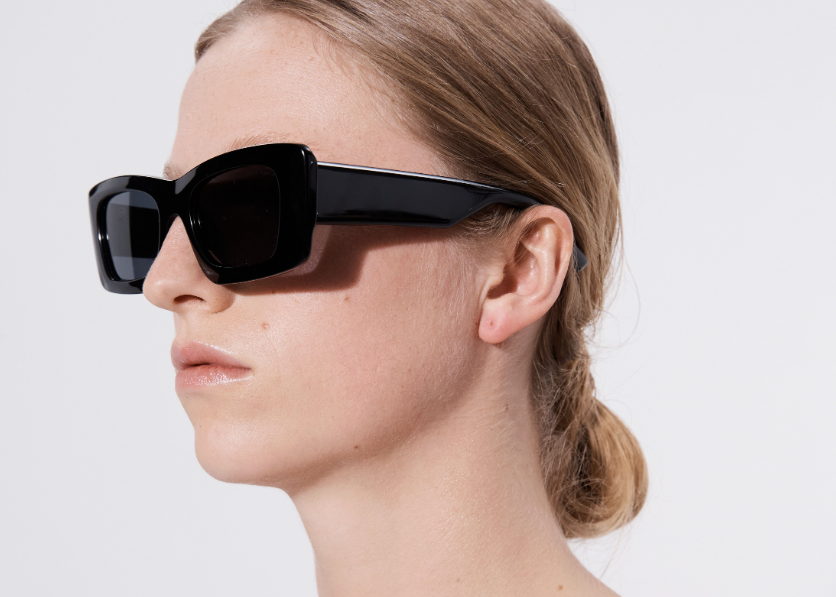Şener Besim Acetate 2 black sunglasses worn, chunky rectangular acetate frame, side view