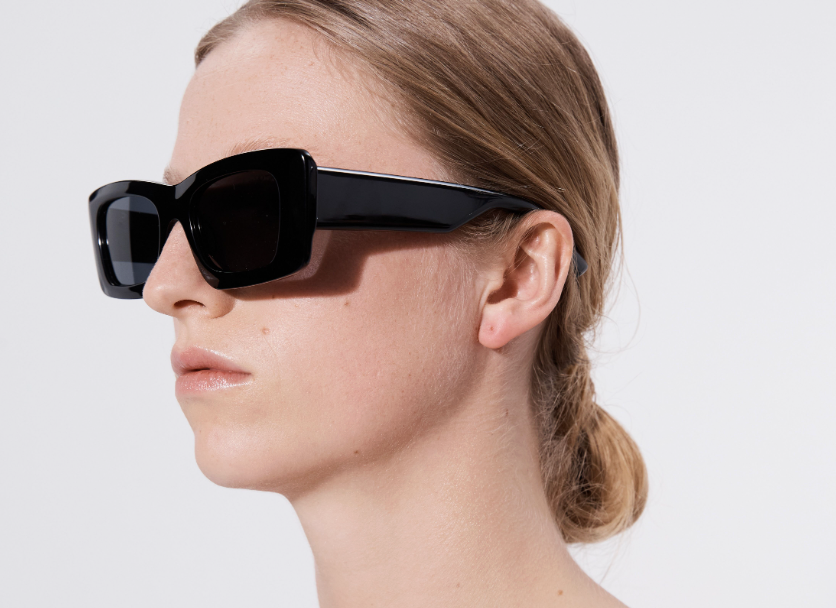 Şener Besim Acetate 2 black sunglasses worn, chunky rectangular acetate frame, side view