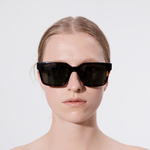 Şener Besim Acetate 3 tortoise sunglasses worn, oversized square Italian acetate frame, front view