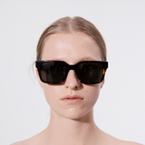 Şener Besim Acetate 3 tortoise sunglasses worn, oversized square Italian acetate frame, front view