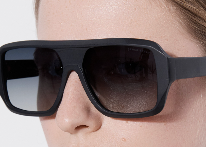 Şener Besim Acetate 6 matte black sunglasses worn, flat-top oversized acetate frame, close up