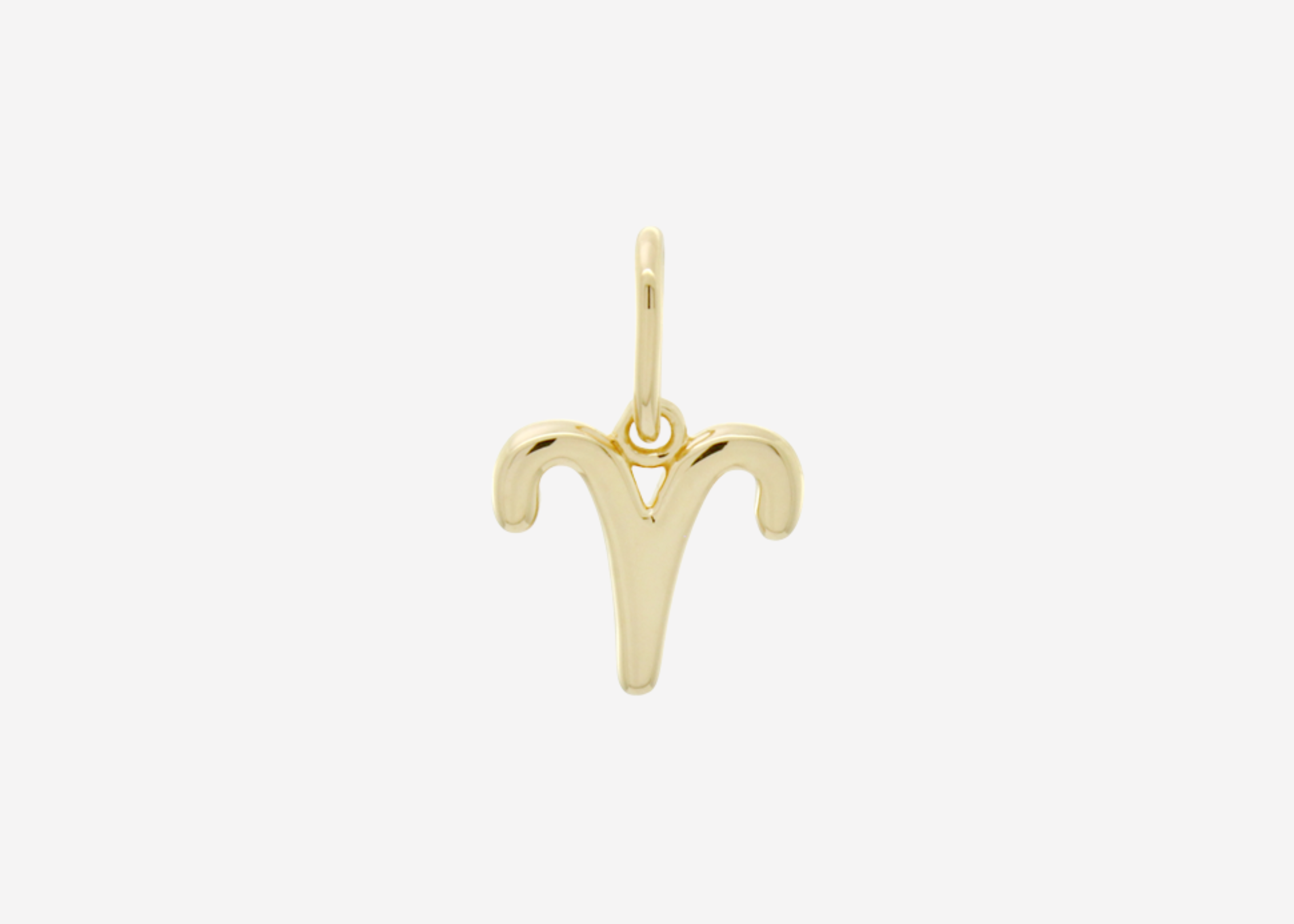 Şener Besim Aries Charm in 14ct gold plating, flat lay