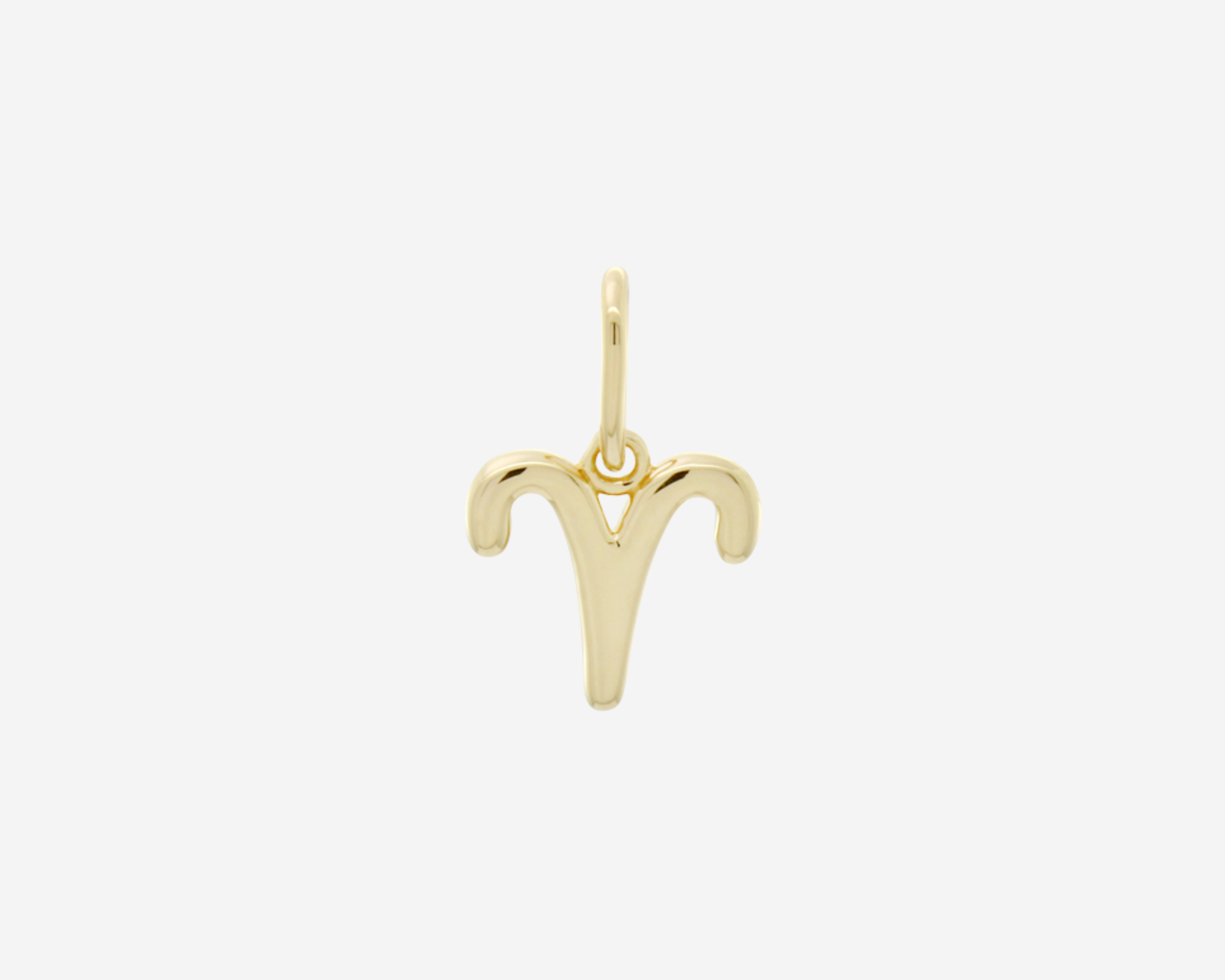 Şener Besim Aries Charm in 14ct gold plating, flat lay