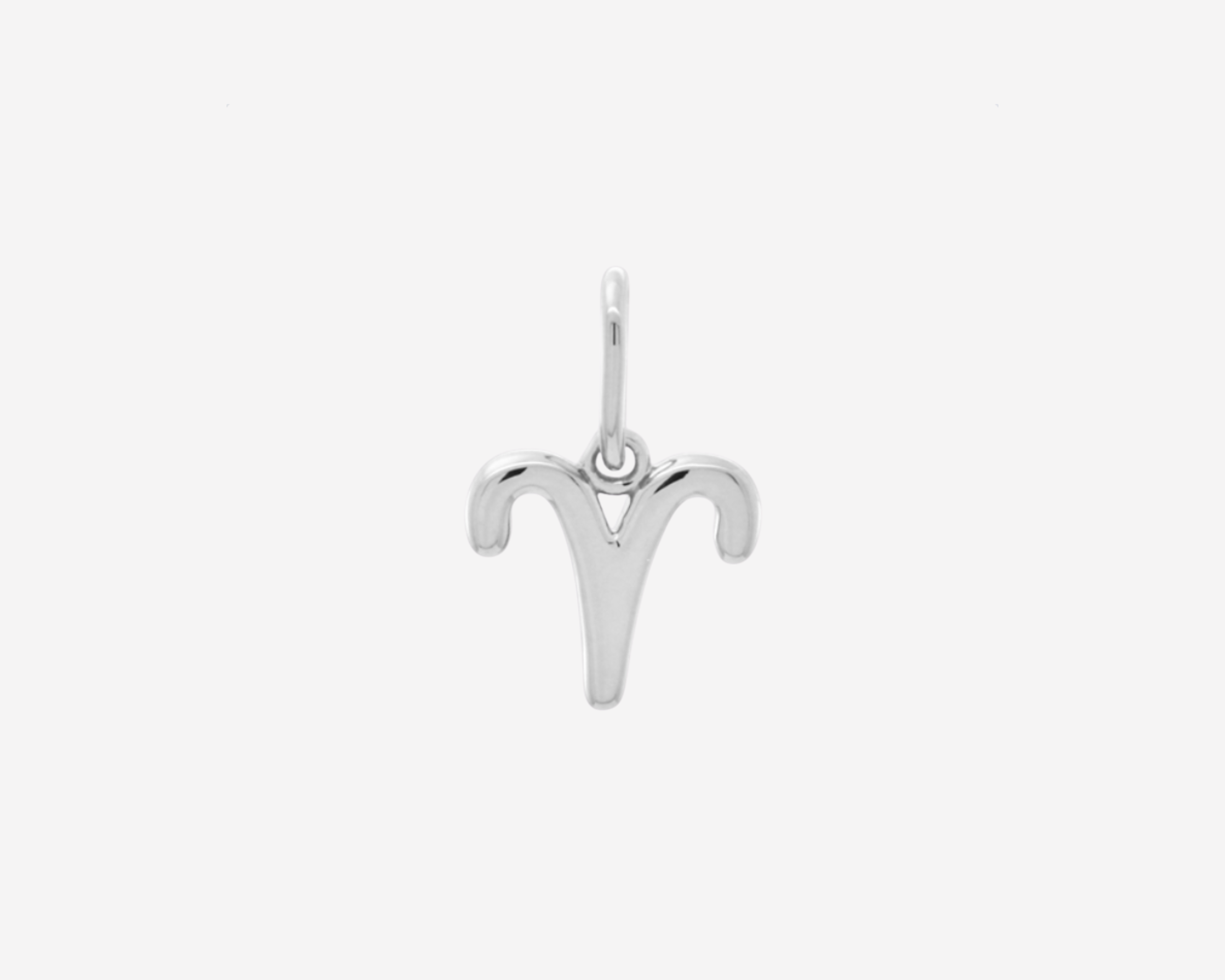 Şener Besim Aries Charm in silver rhodium plating, flat lay