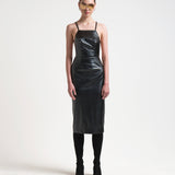 bared back leather apron style leather dress on model by sener besim