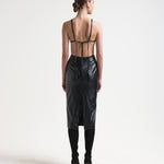 open back dress on model with ties in vegan leather by sener besim