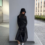 Thumbhole turtleneck in black worn on model — Şener Besim