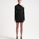 A model wearing a black asymmetric neckline, long-sleeved, mini-length bonded dress with a sharp, angular design.