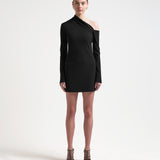 A model wearing a black asymmetric neckline, long-sleeved, mini-length bonded dress with a sharp, angular design.
