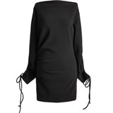 Bonded mini dress in black with tie cuff sleeves — Şener Besim