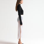 Black cropped knit cardigan with button-through front and thumbhole detail — Şener Besim