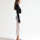 Black cropped knit cardigan with button-through front and thumbhole detail — Şener Besim