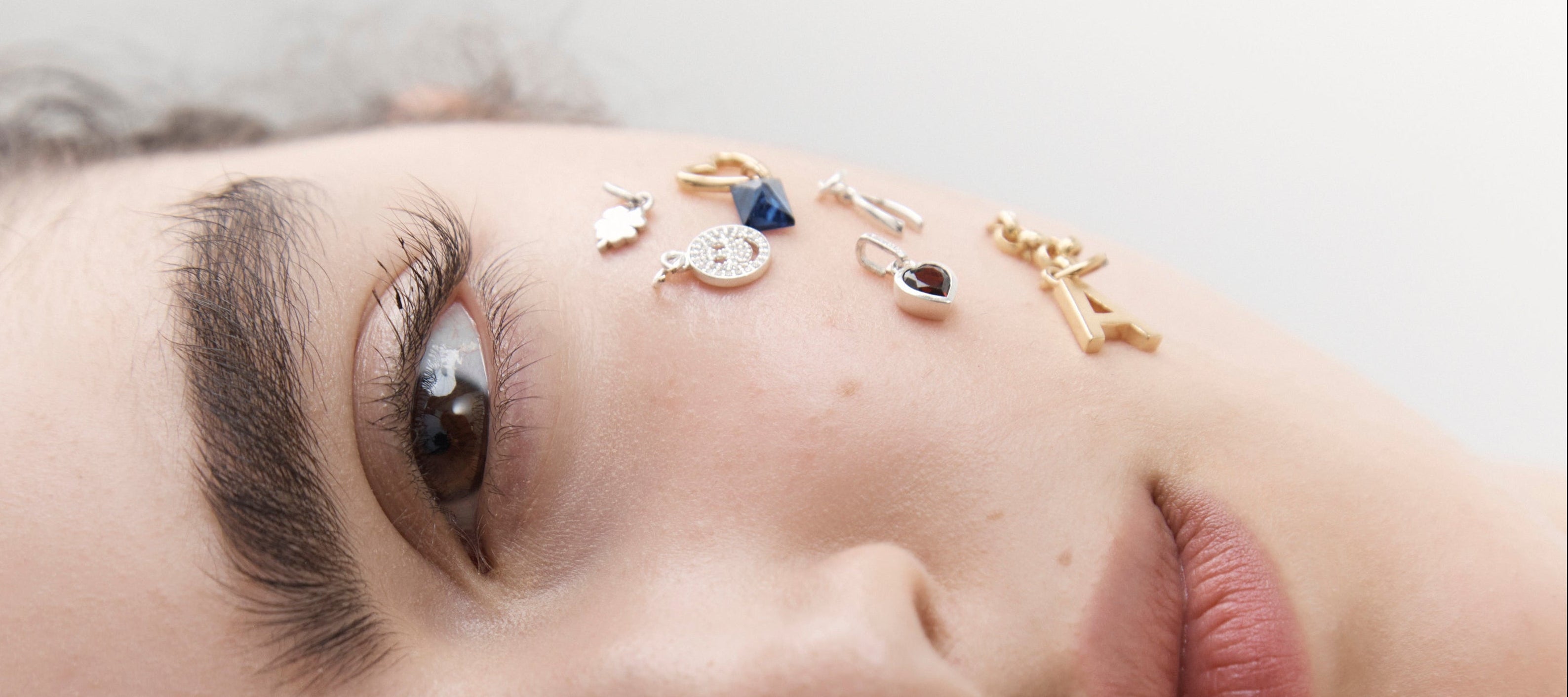 Şener Besim Buildable Collection Charms featured on model