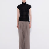 Merino cap sleeve turtleneck top black, model front view — Şener Besim