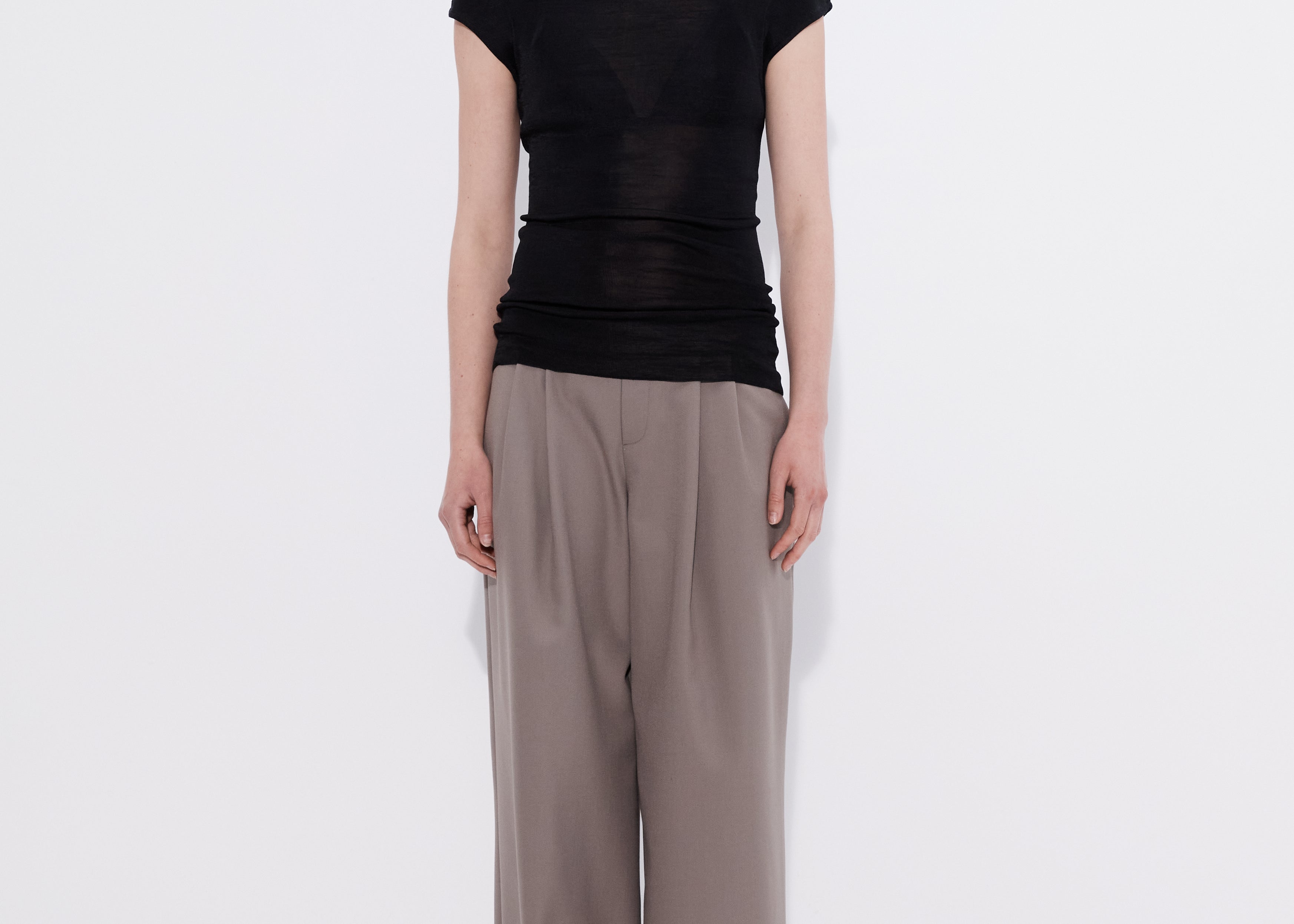 Merino cap sleeve turtleneck top black, model front view — Şener Besim