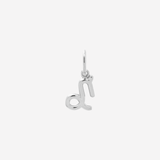 Şener Besim Capricorn Charm in silver rhodium plating, flat lay