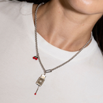 Şener Besim Cherry Charm worn on necklace — Buildable Collection