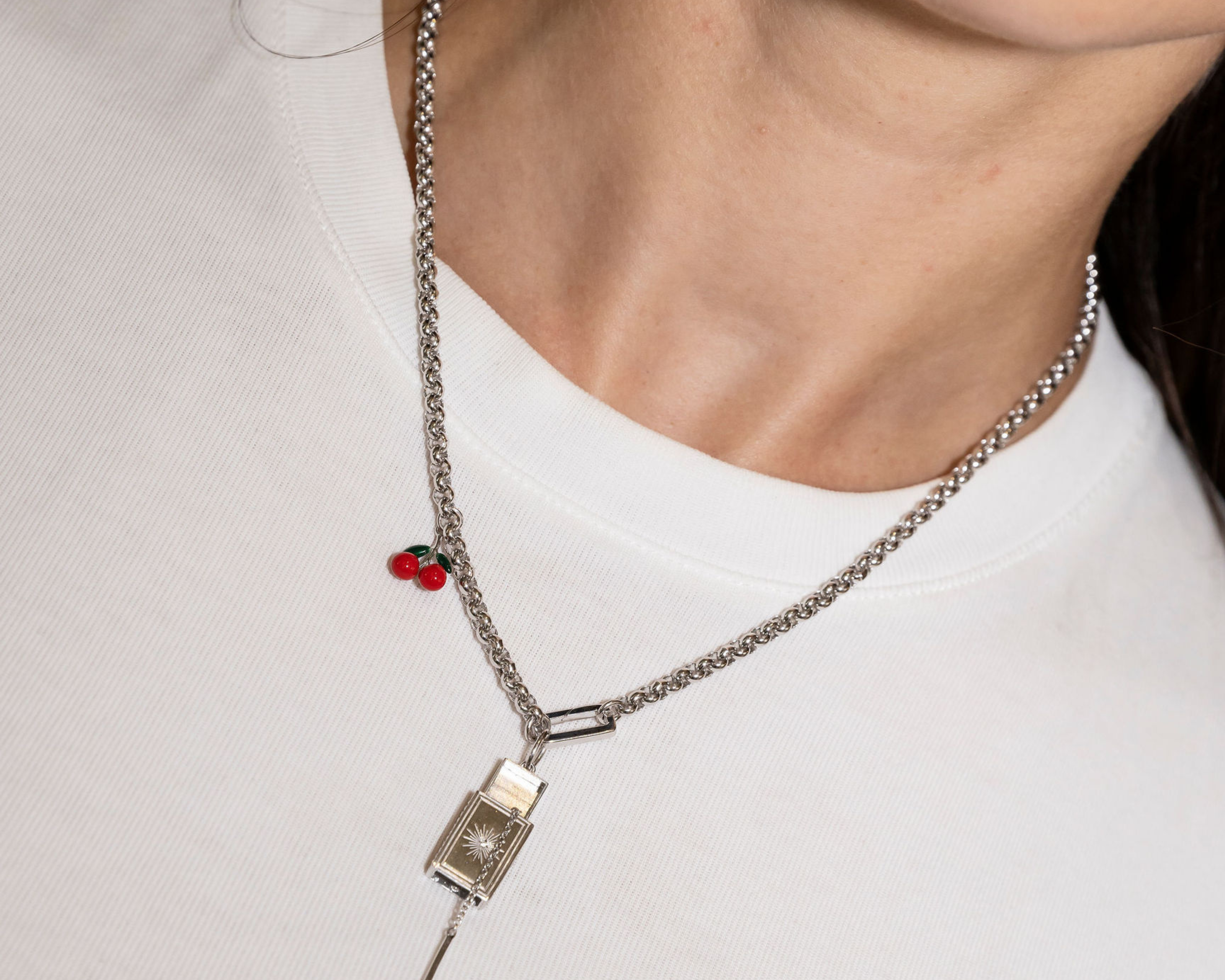 Şener Besim Cherry Charm worn on necklace — Buildable Collection