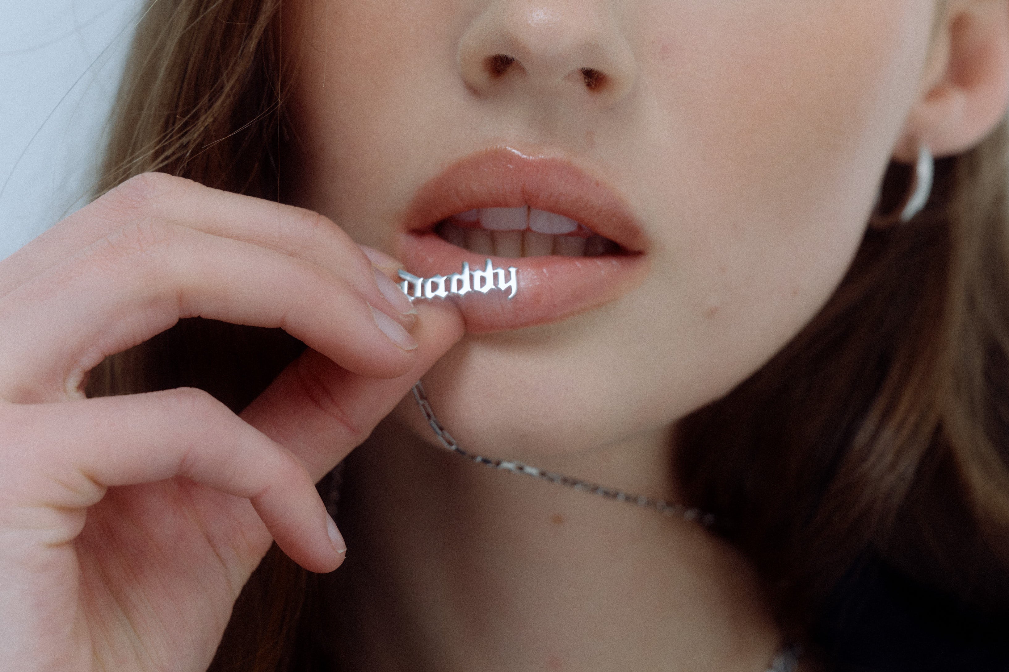 Daddy Gothic Charm Silver by Şener Besim featuring “Daddy” in gothic lettering worn