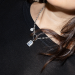Şener Besim Smiley Face Charm worn on Buildable Necklace — Buildable Collection