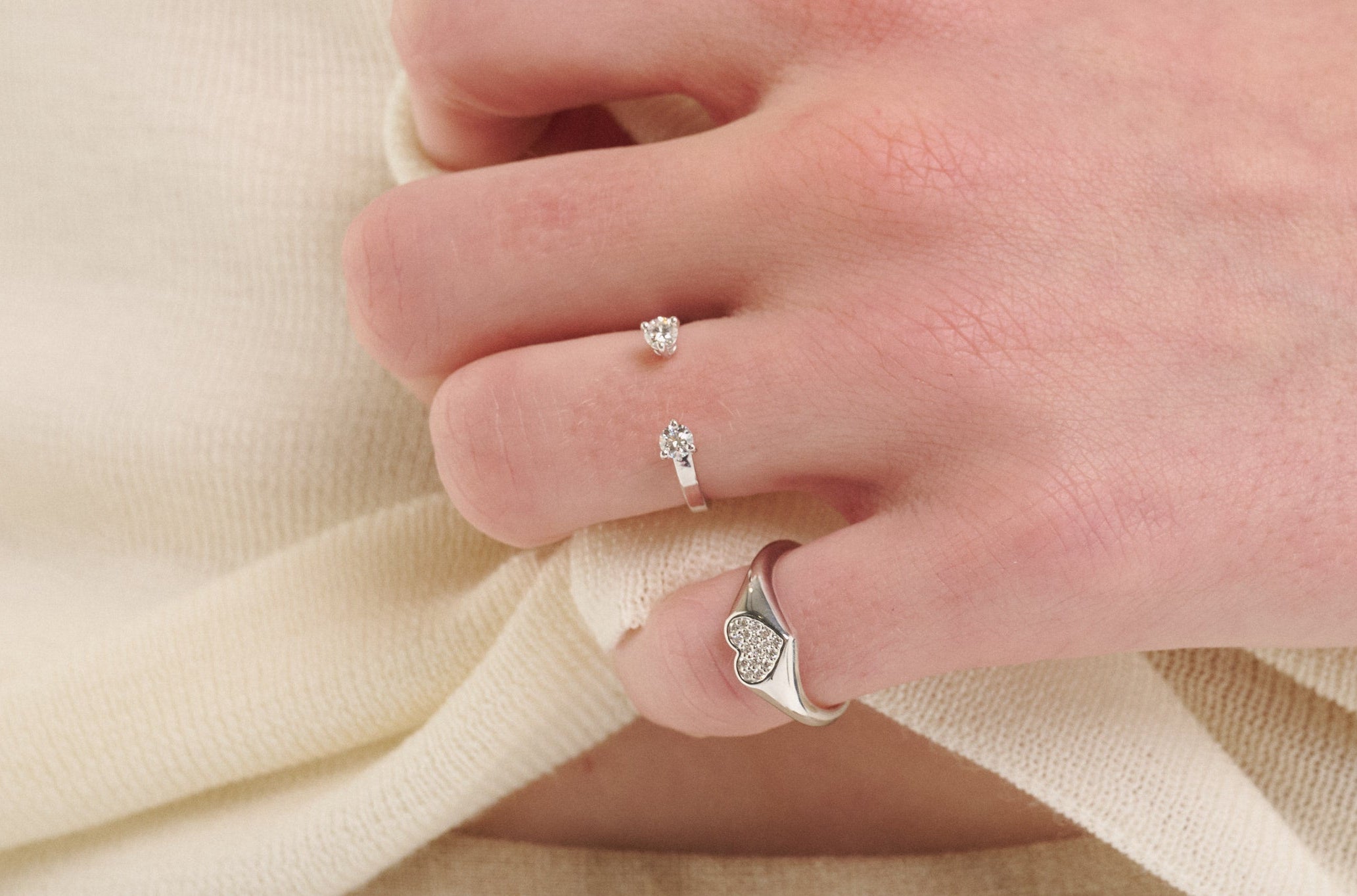Şener Besim Double Diamond Ring in silver rhodium plating, stacked on model hand