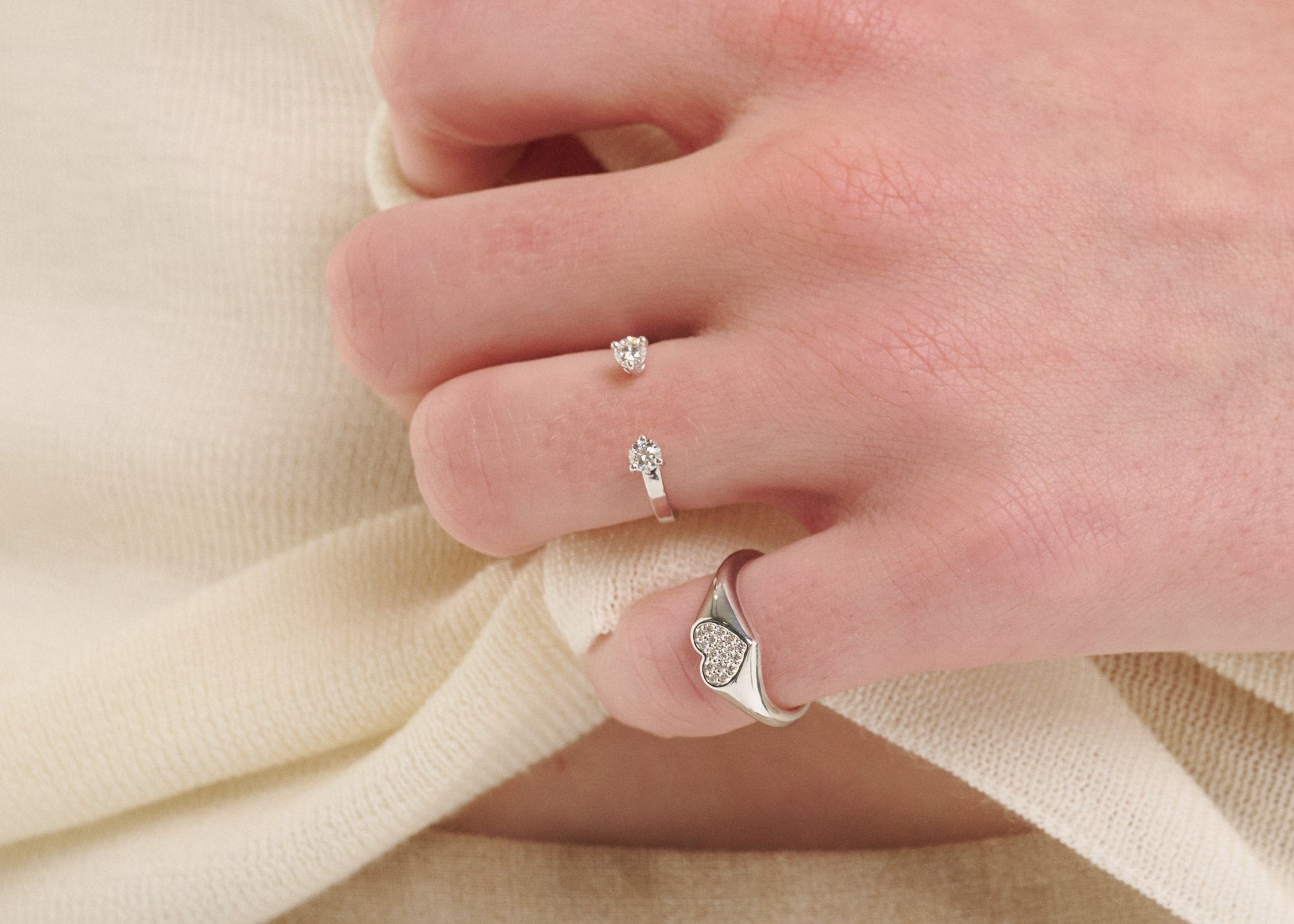 Şener Besim Double Diamond Ring in silver rhodium plating, stacked on model hand
