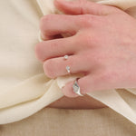 Şener Besim Double Diamond Ring in silver rhodium plating, stacked on model hand