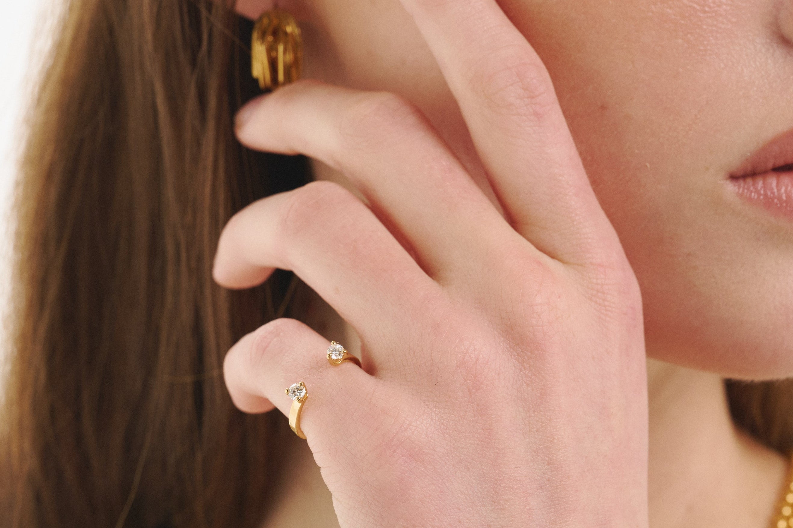 Şener Besim Double Diamond Ring in 14ct gold plating, worn hand