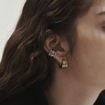 Şener Besim Gold & Silver Dynasty Earrings worn on model