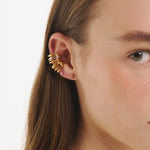 Şener Besim Dynasty Ear Cuff in gold — worn