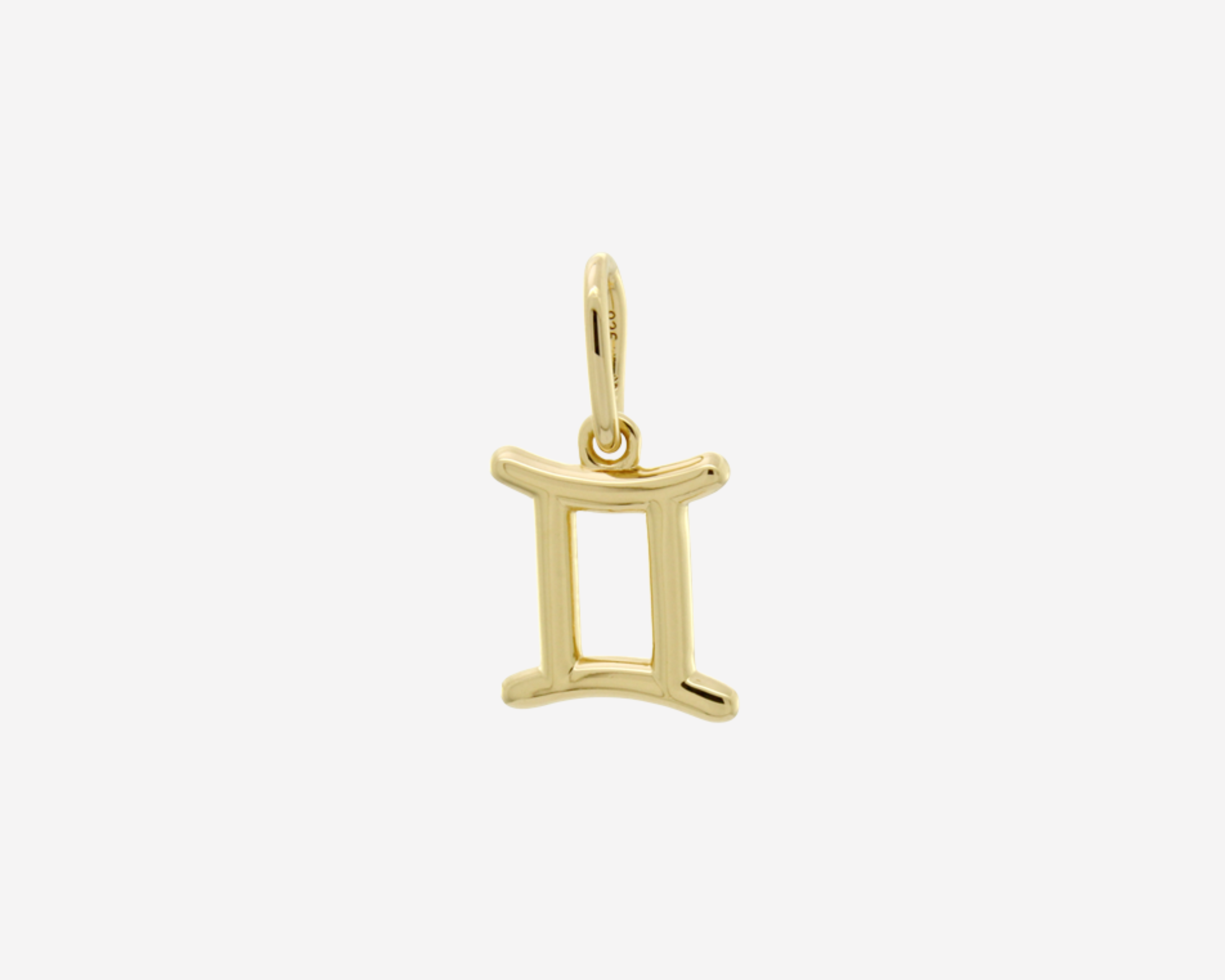 Şener Besim Gemini Charm in 14ct gold plating, flat lay